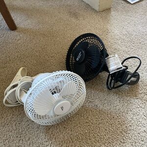 Two comfort zone clip on fans